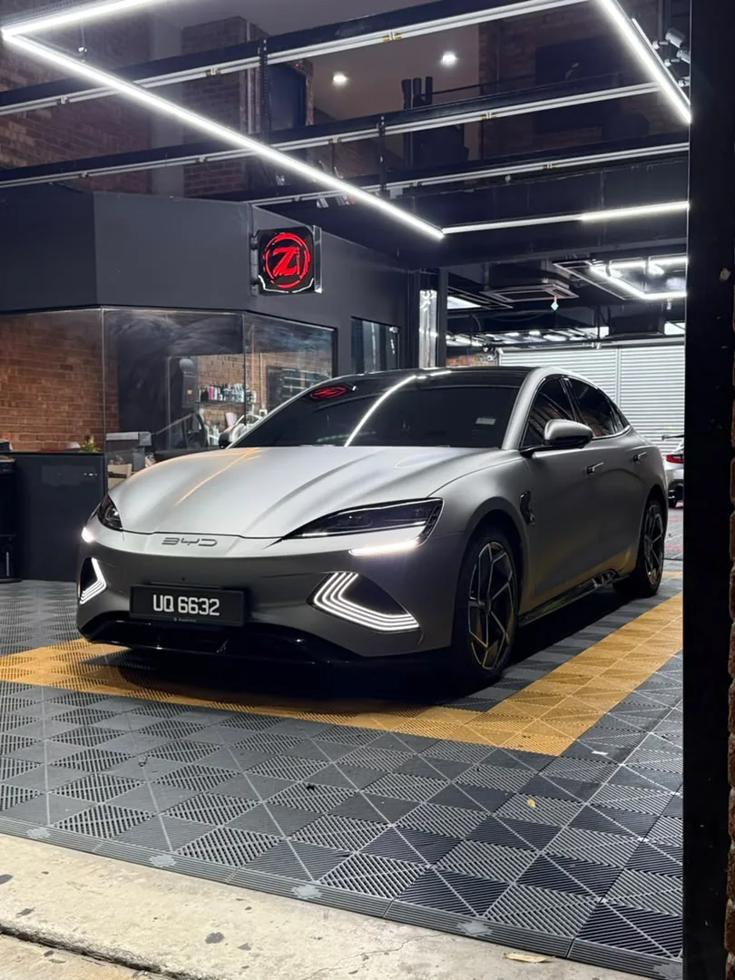 Matte graphite wrap on an electric sedan by Z-Sticker, Selangor