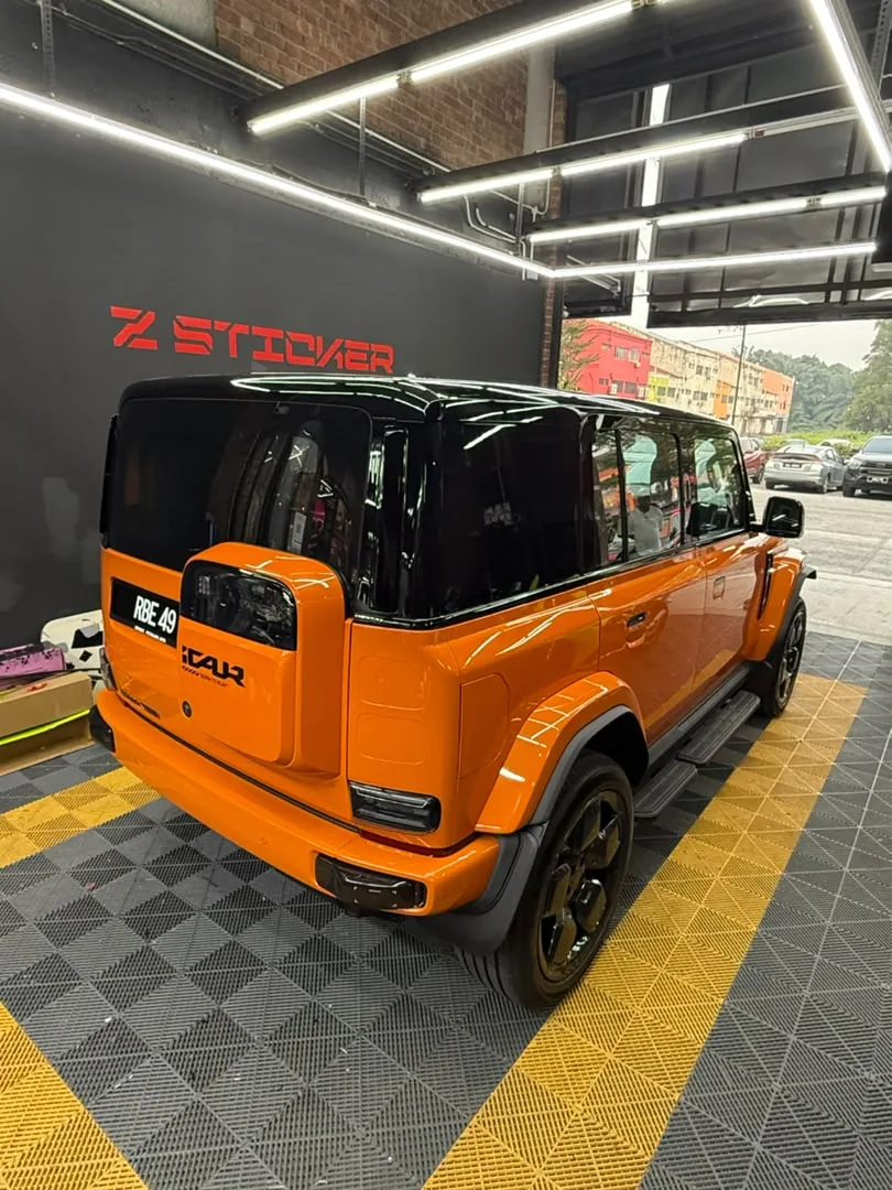 Front view of matte orange wrap on a Ford Bronco by Z-Sticker