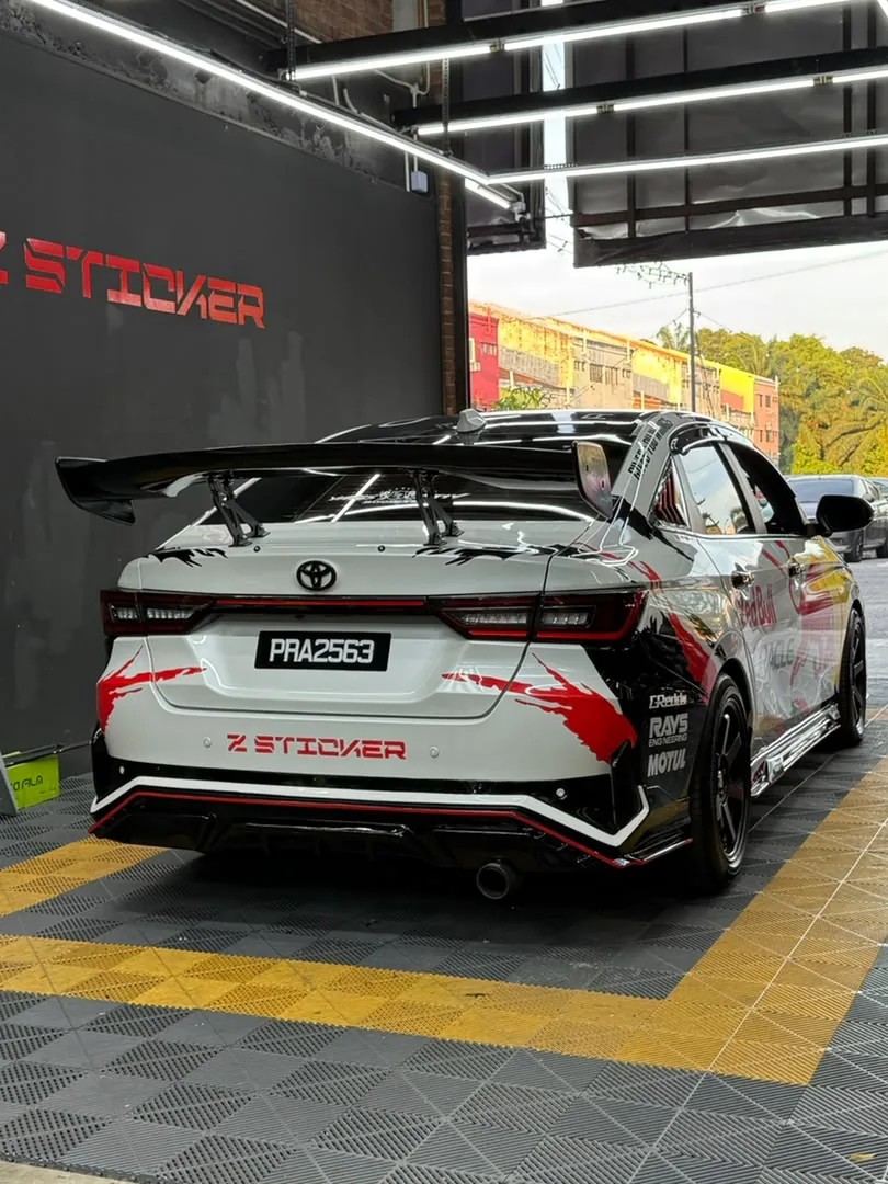Rear view of Red Bull-inspired livery wrap on a Lexus coupe by Z-Sticker