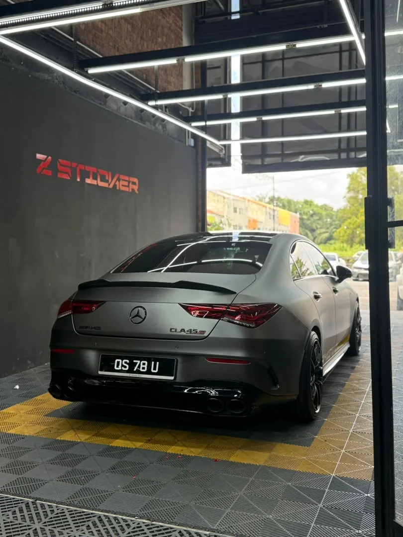 Rear view of matte graphite wrap on a Mercedes-AMG CLA by Z-Sticker