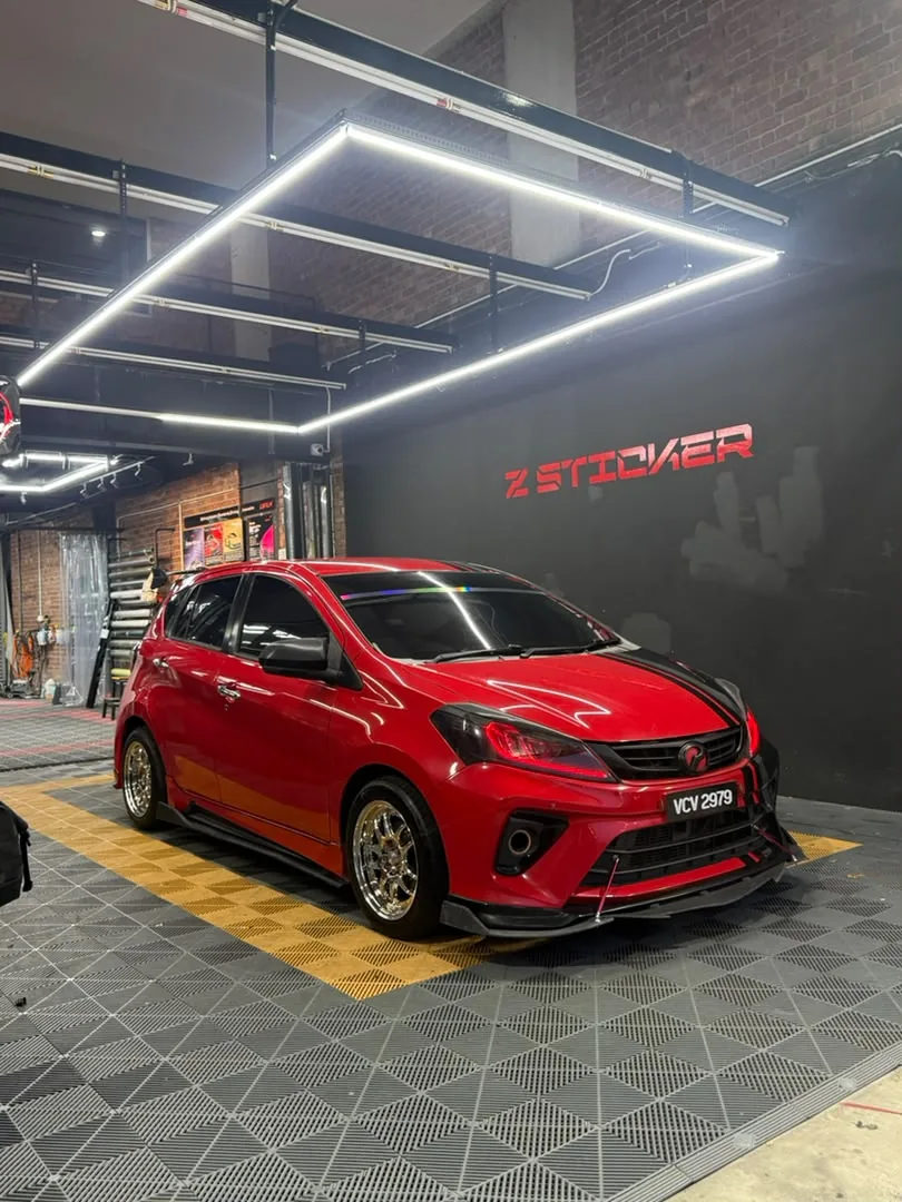 Gloss red wrap on a Perodua Myvi by Z-Sticker, Klang