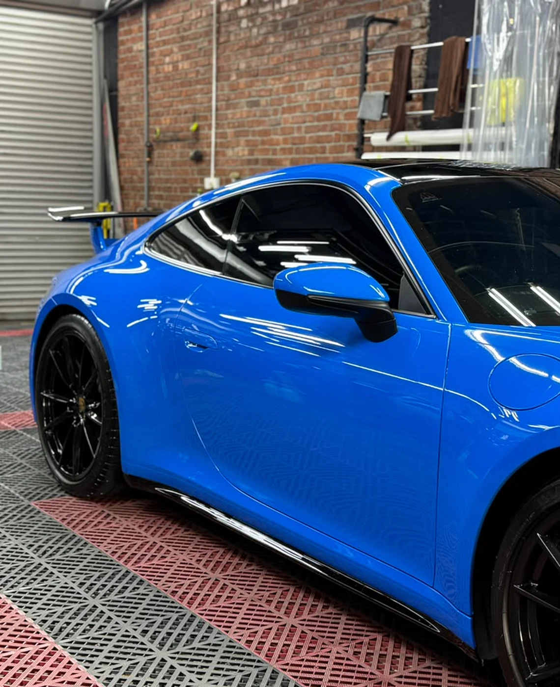Gloss blue wrap on a Porsche 911 by Z-Sticker