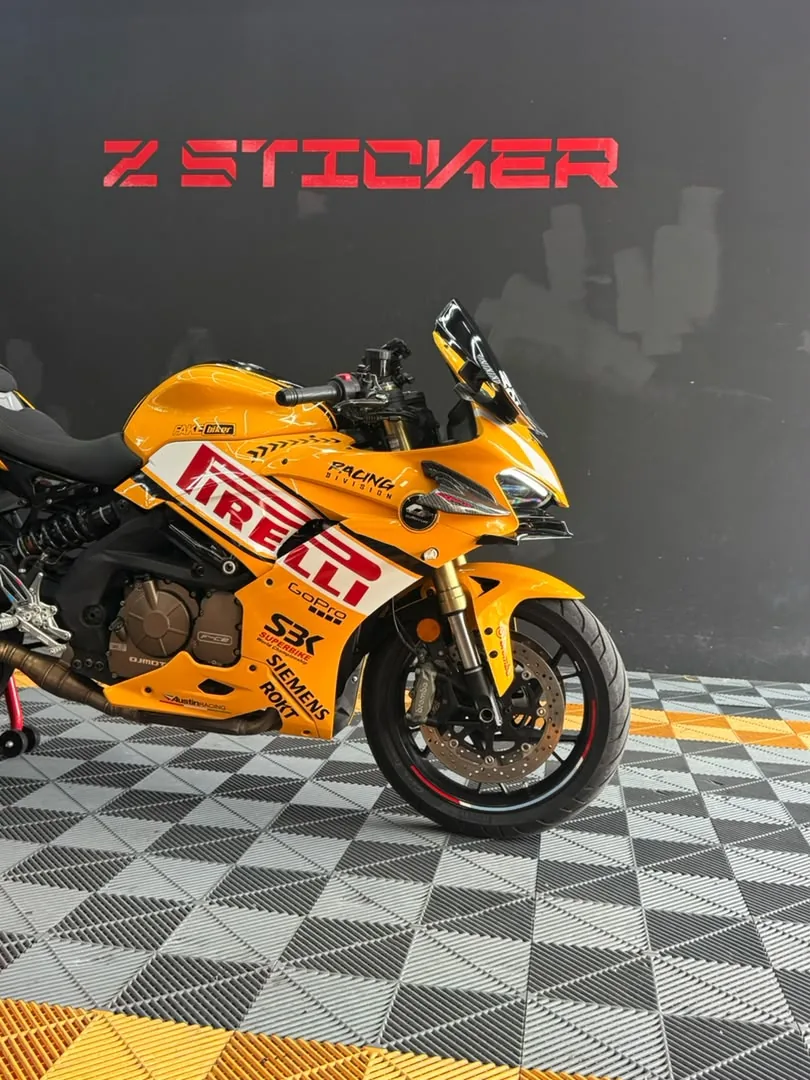 Close-up of yellow Pirelli racing wrap on a sportbike by Z-Sticker