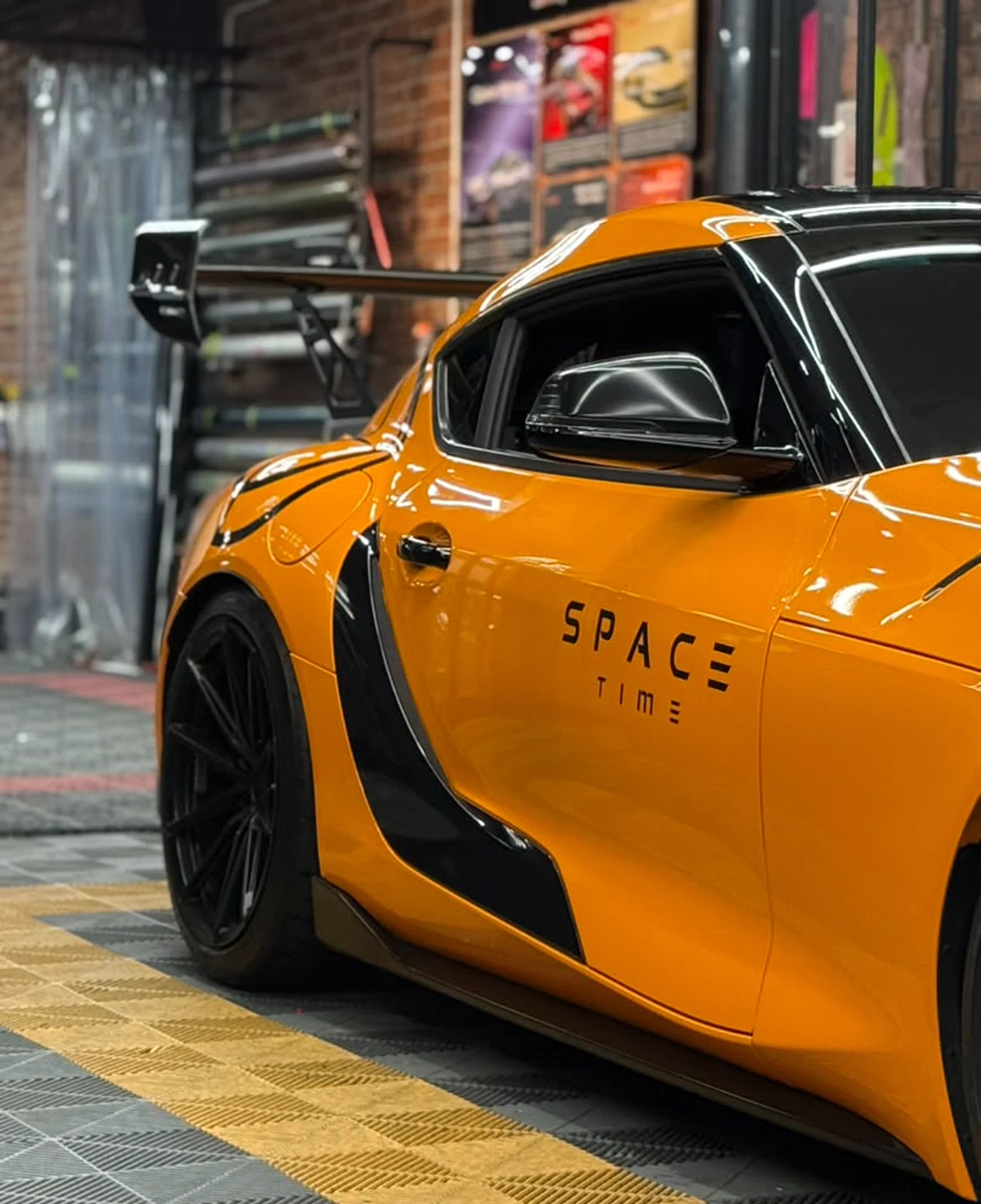 Orange wrap on a Toyota Supra by Z-Sticker