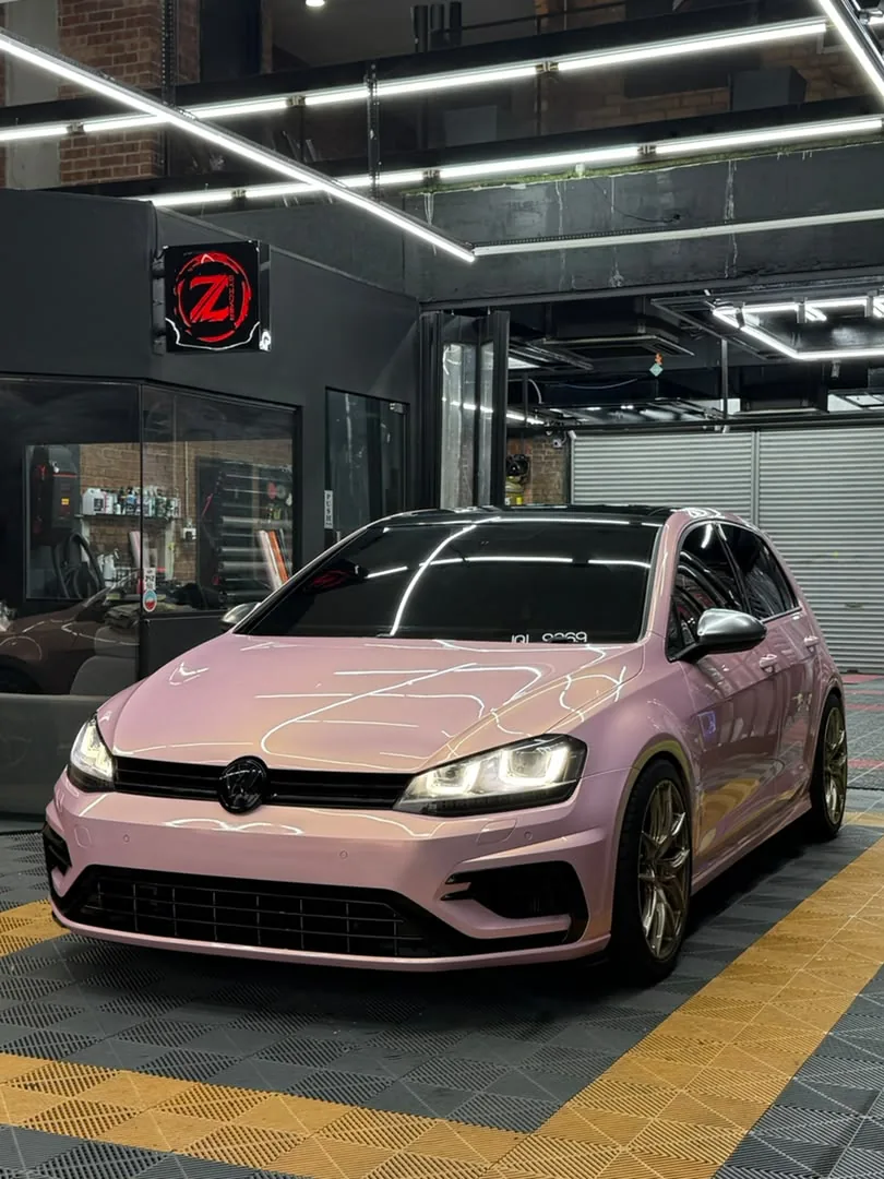 Gloss pink colour-change wrap on a Volkswagen Golf R by Z-Sticker