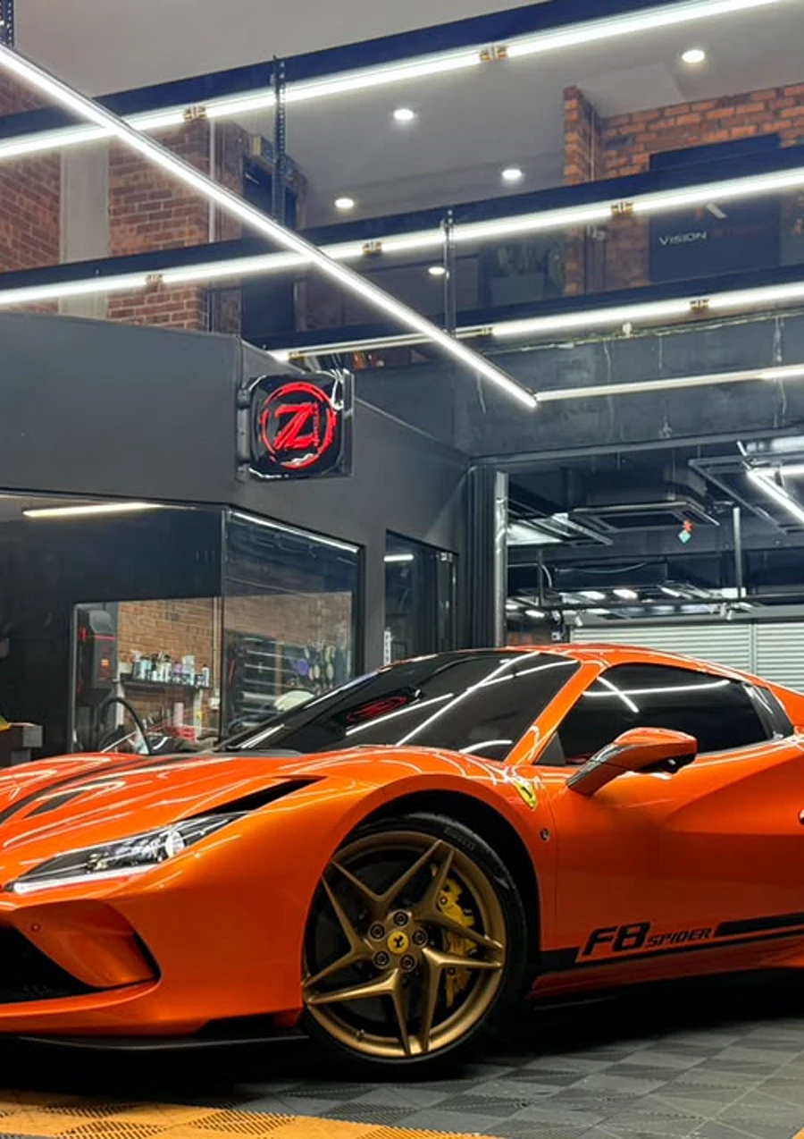 Orange full wrap on a Ferrari F8 by Z-Sticker